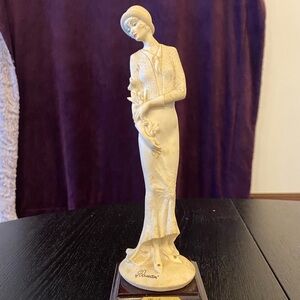 Cream and Brown Classical Sculpture Art